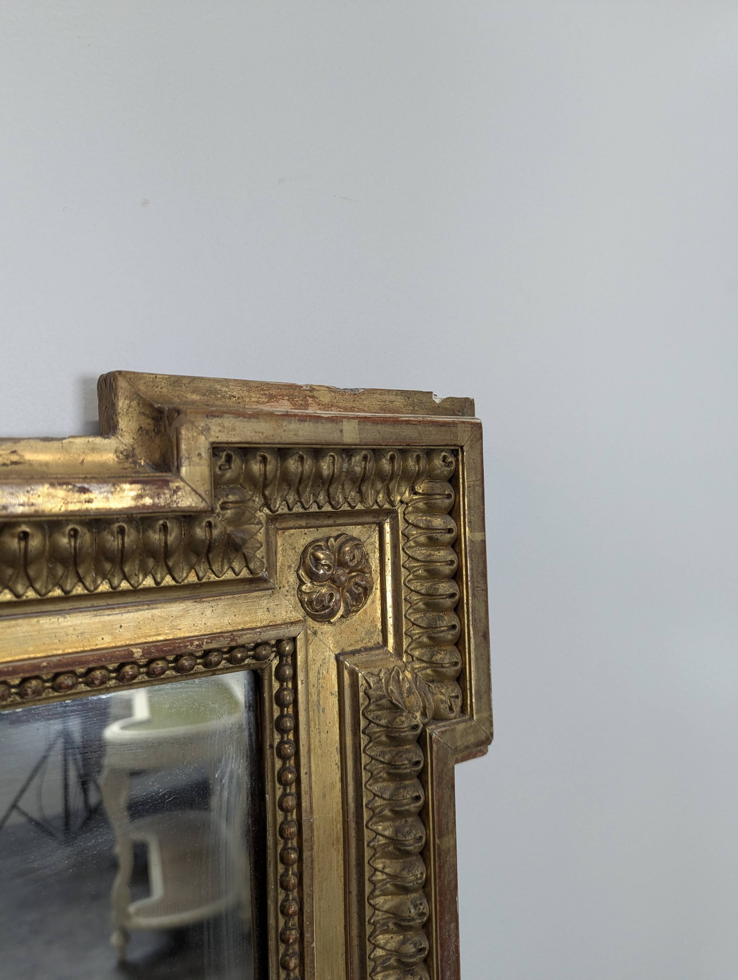 Large stucco and gilded wood mirror from the Napoléon III period.