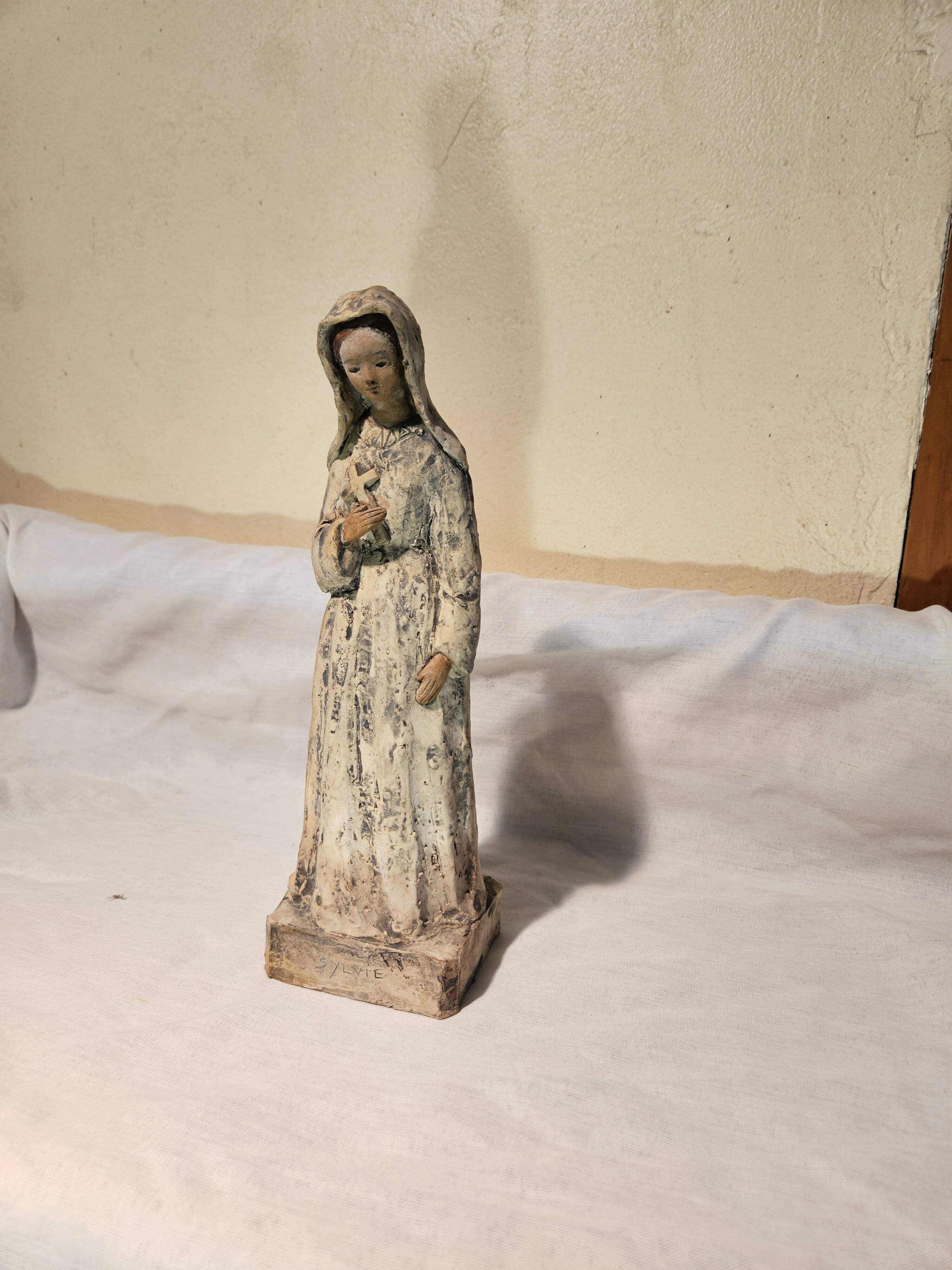 Painted terracotta holy virgin statue