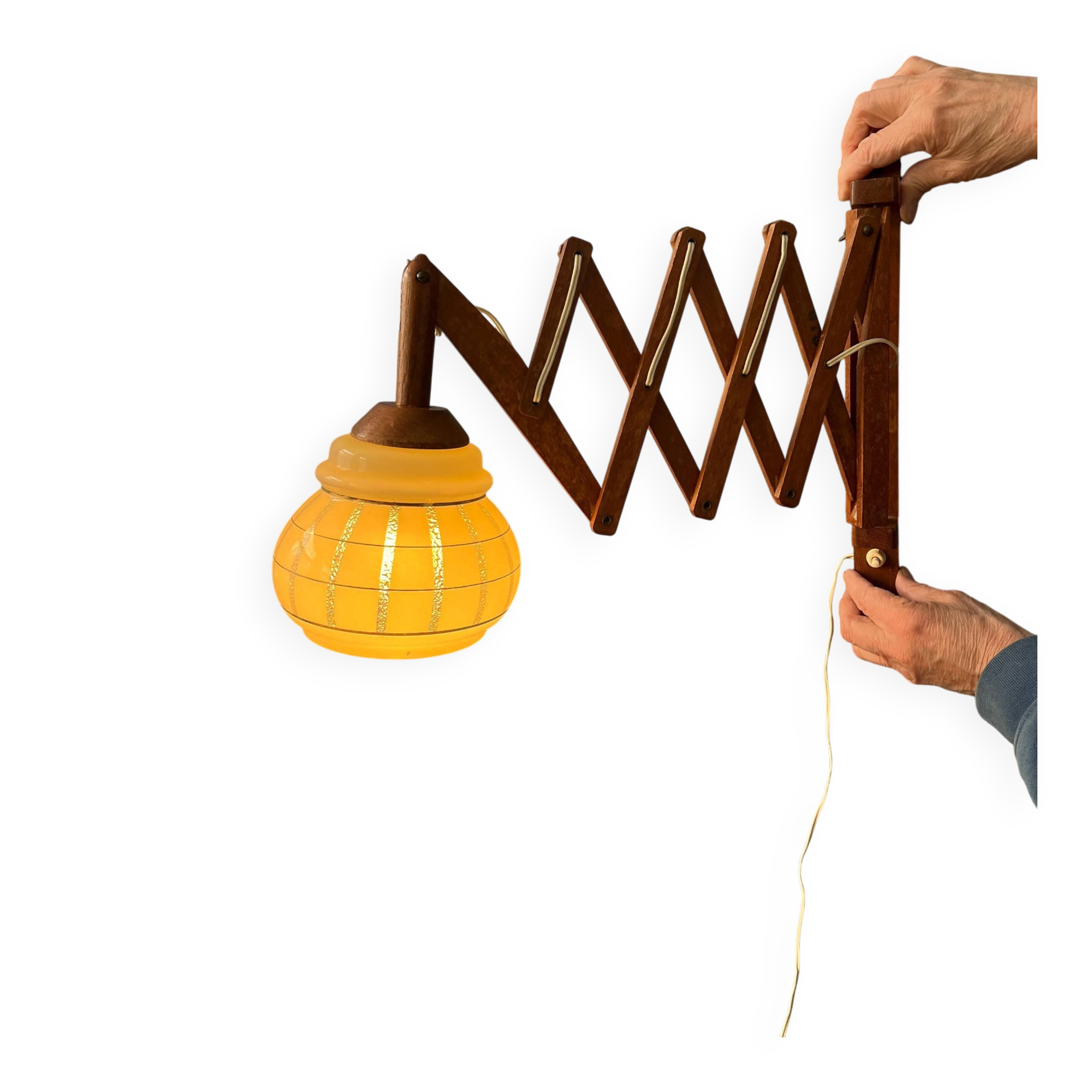 Vintage wall lamp with teak wood scissors and glass shade.