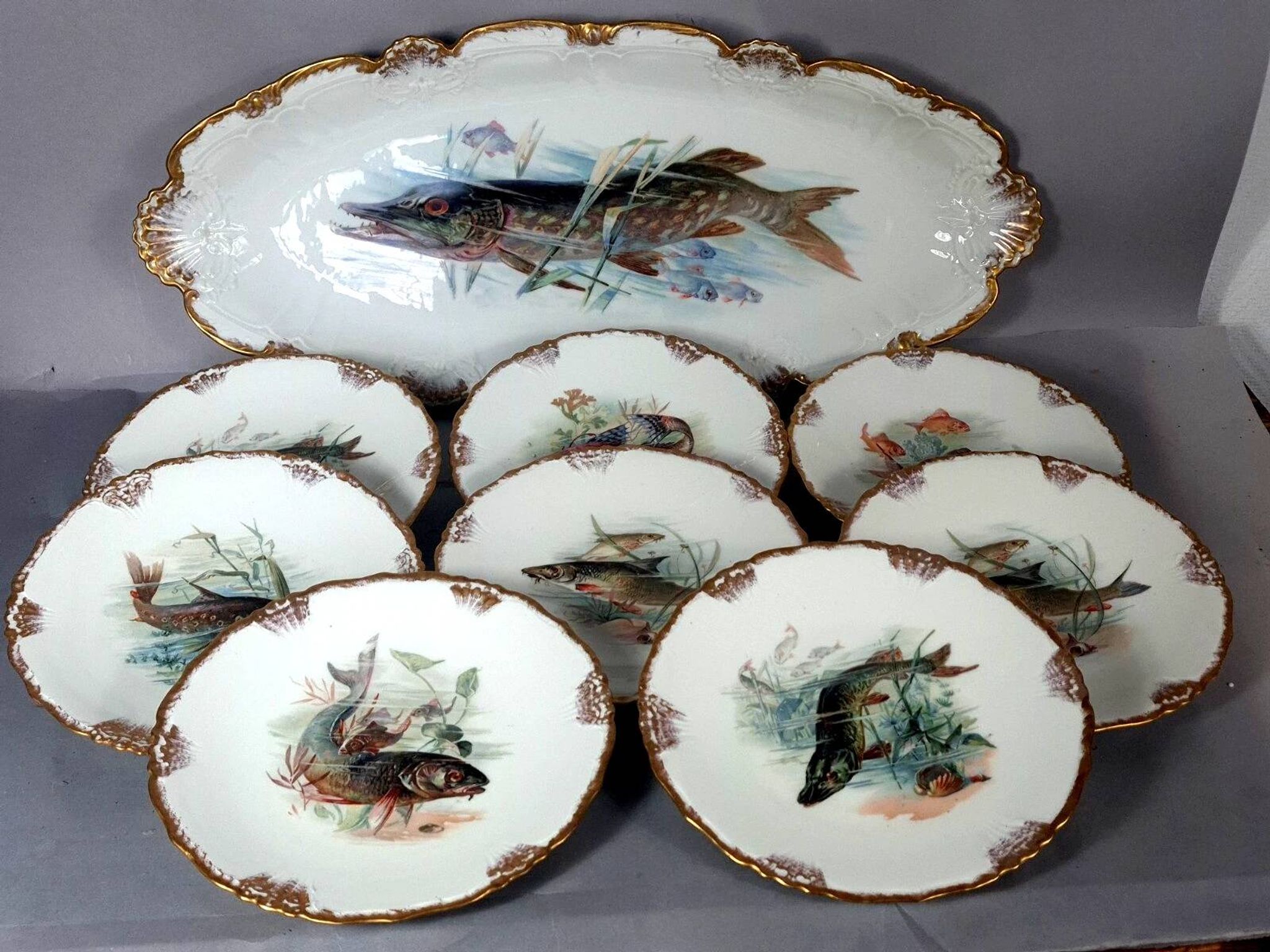 Antique fish service J. Pouyat porcelain Limoges plate 61 cm, 8 plates