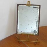 Table mirror on a brass easel