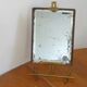 Table mirror on a brass easel