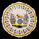 Assiette en faience de Malicorne signé emile tessier decor oiseau