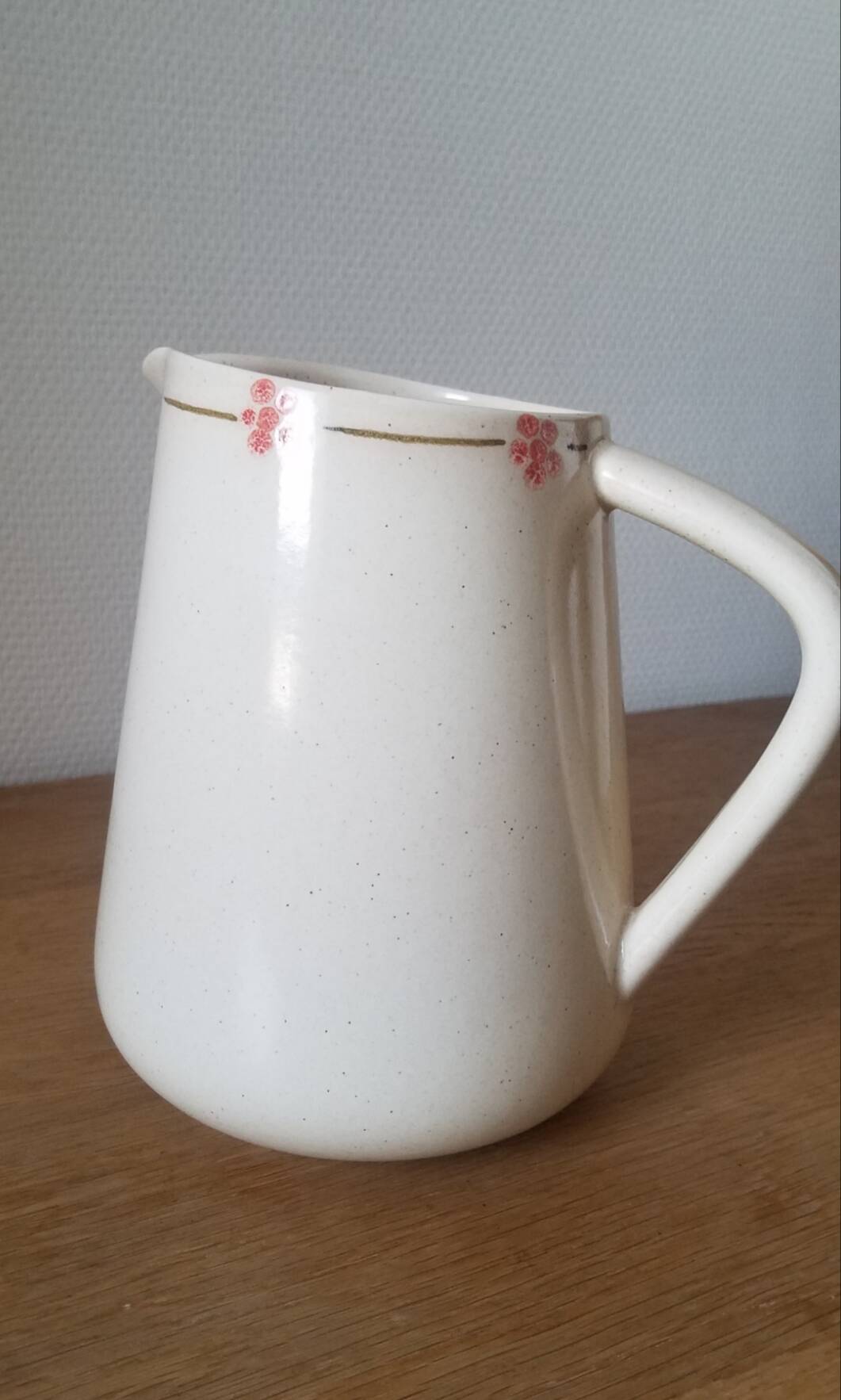Hand-painted glazed ceramic pitcher