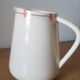 Hand-painted glazed ceramic pitcher