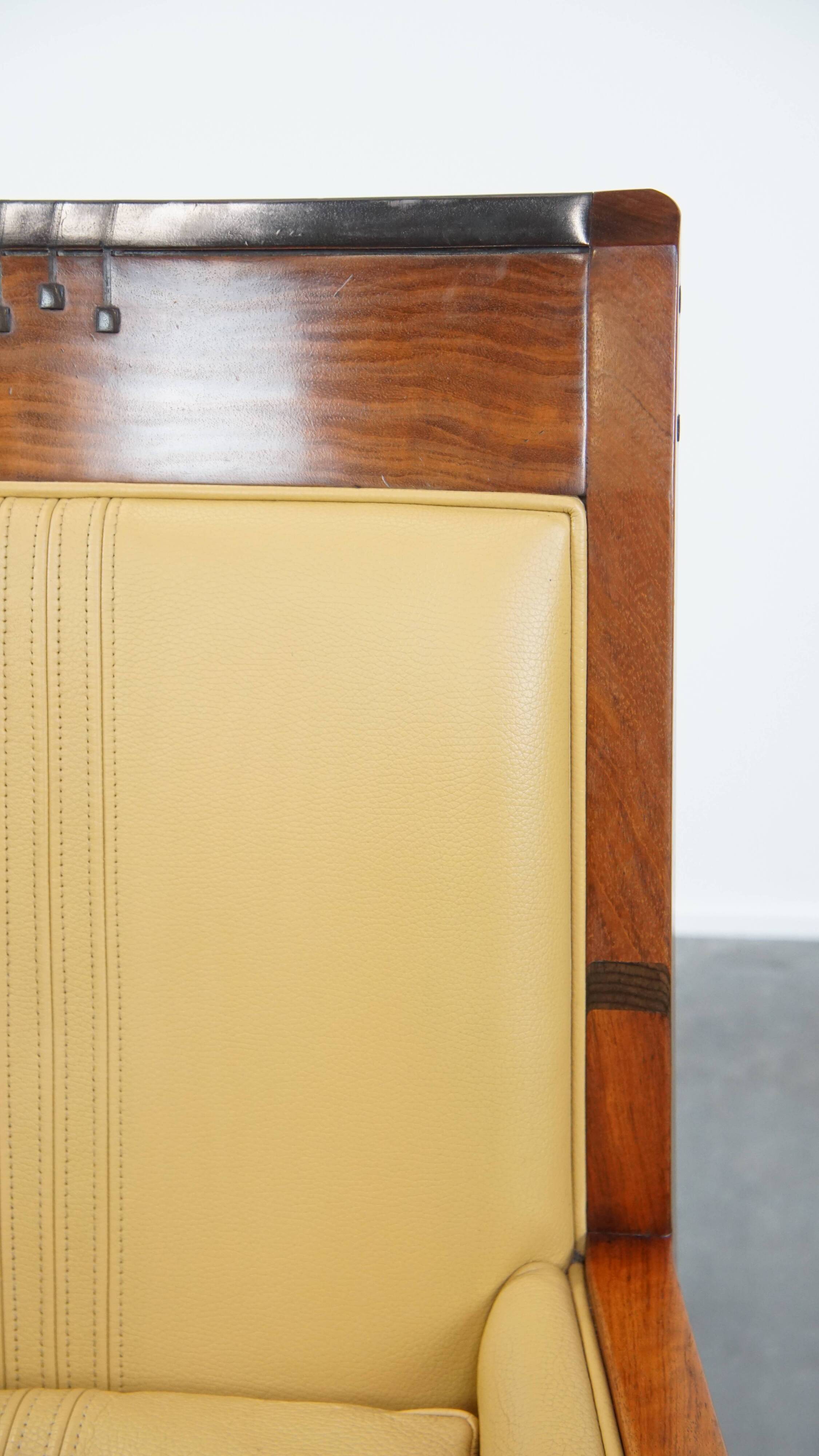 Art Deco armchair in yellow leather with high back