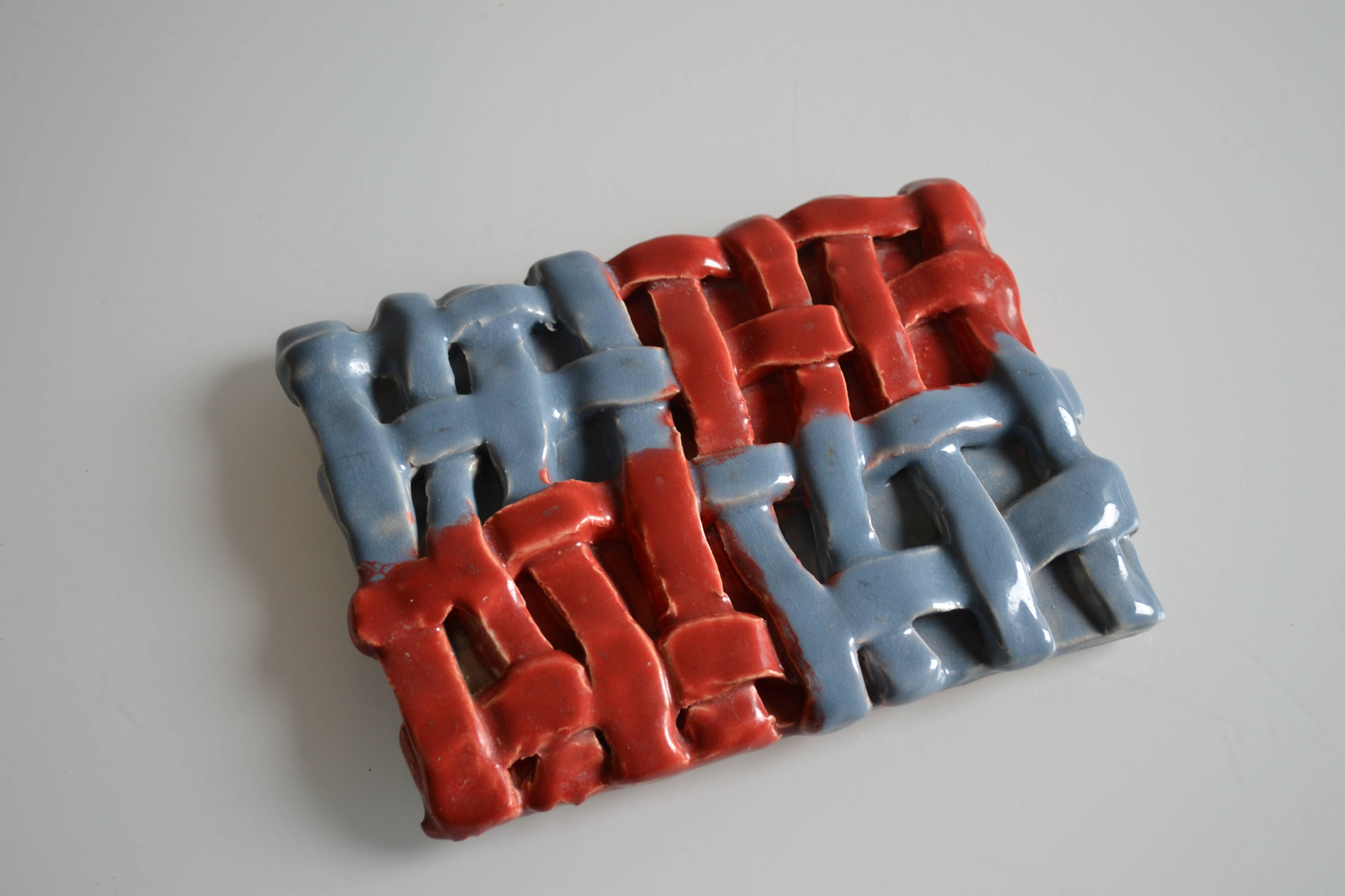 Vintage 1970 woven ceramic rest or trivet