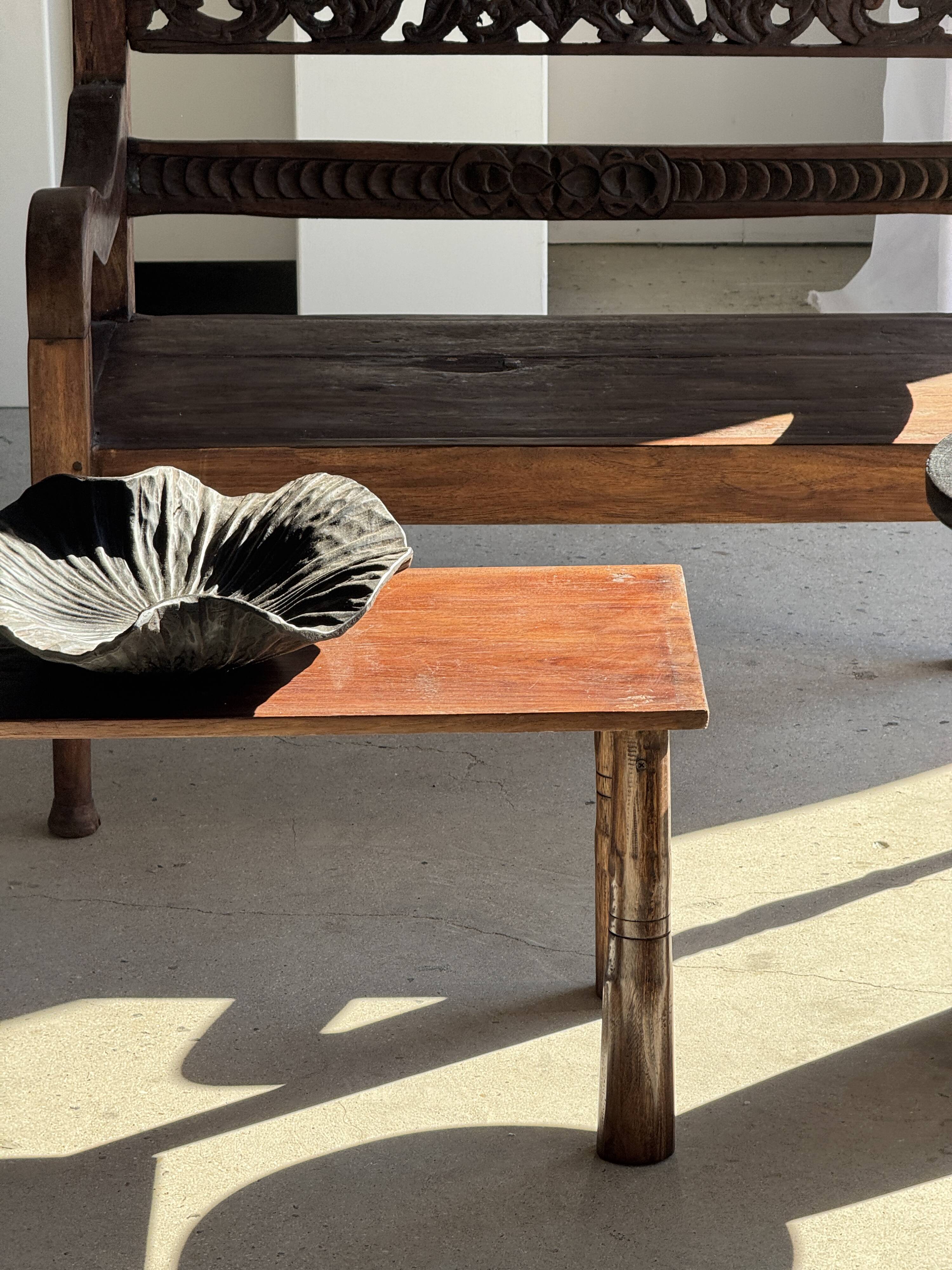Black solid mango side table (monoxyle) with conical legs