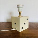 Lamp base representing a die