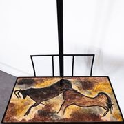 Black metal magazine rack floor lamp with ceramic shelf