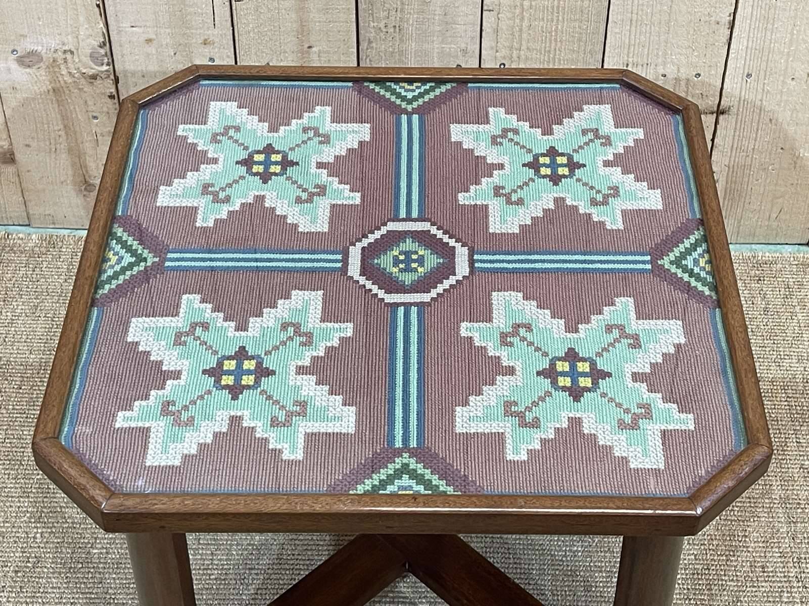Art Deco side table in mahogany, fabric and glass.
