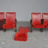 Series of 5 red skai and patinated cast Theater chairs