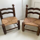 Pair of low oak and straw chairs