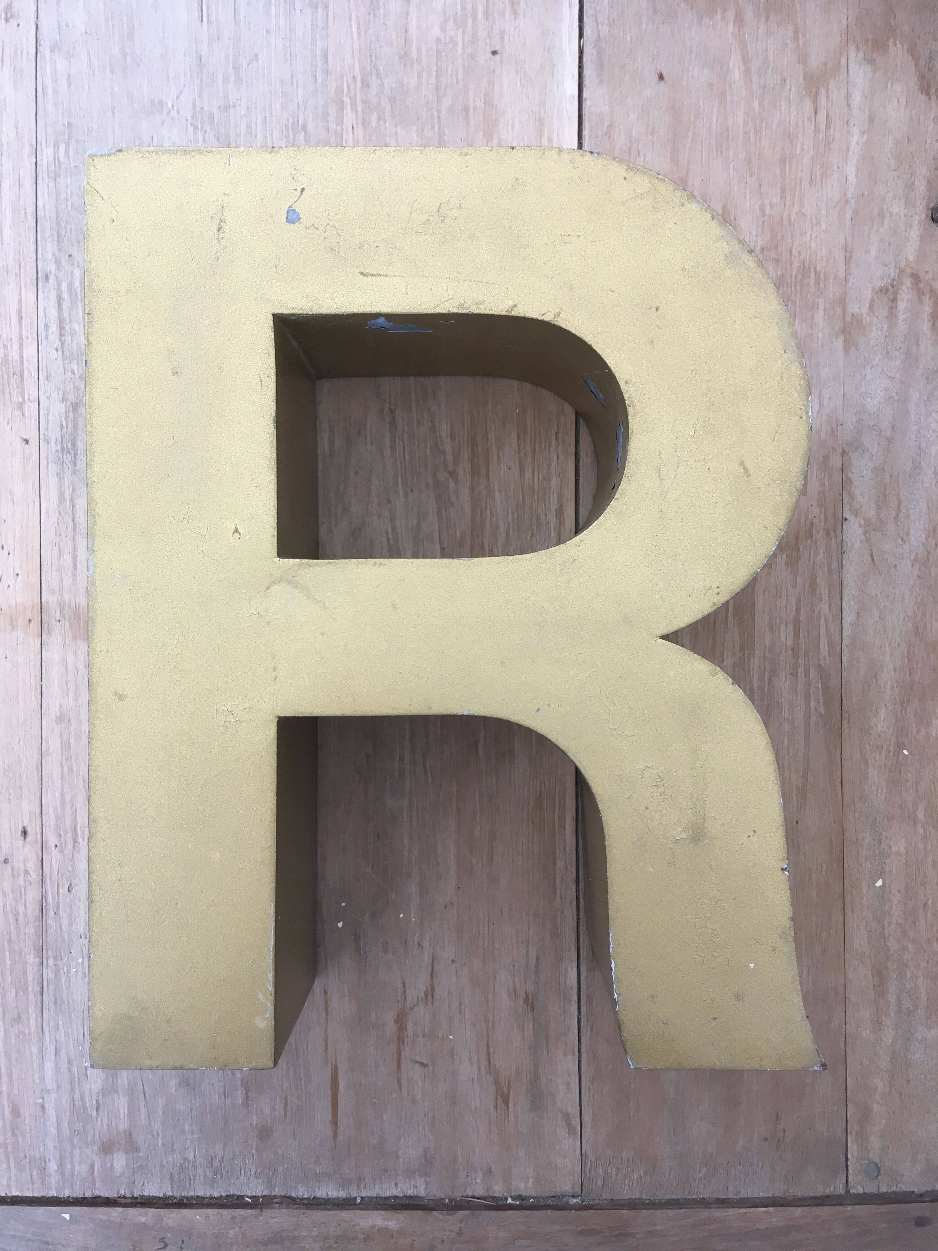 Golden vintage sign letter R