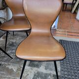 4 vintage chairs in skaï and metal base from the 60s