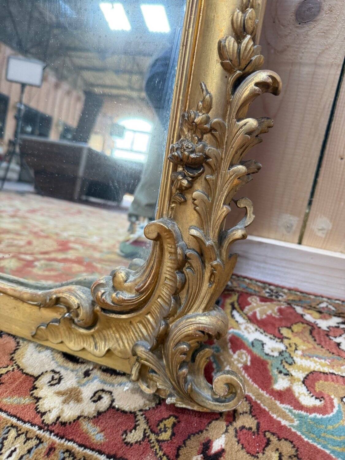 Napoleon III mirror in wood and gilded stucco with gold leaf.