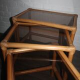 Rattan nesting tables in rattan and smoked glass from the 70s