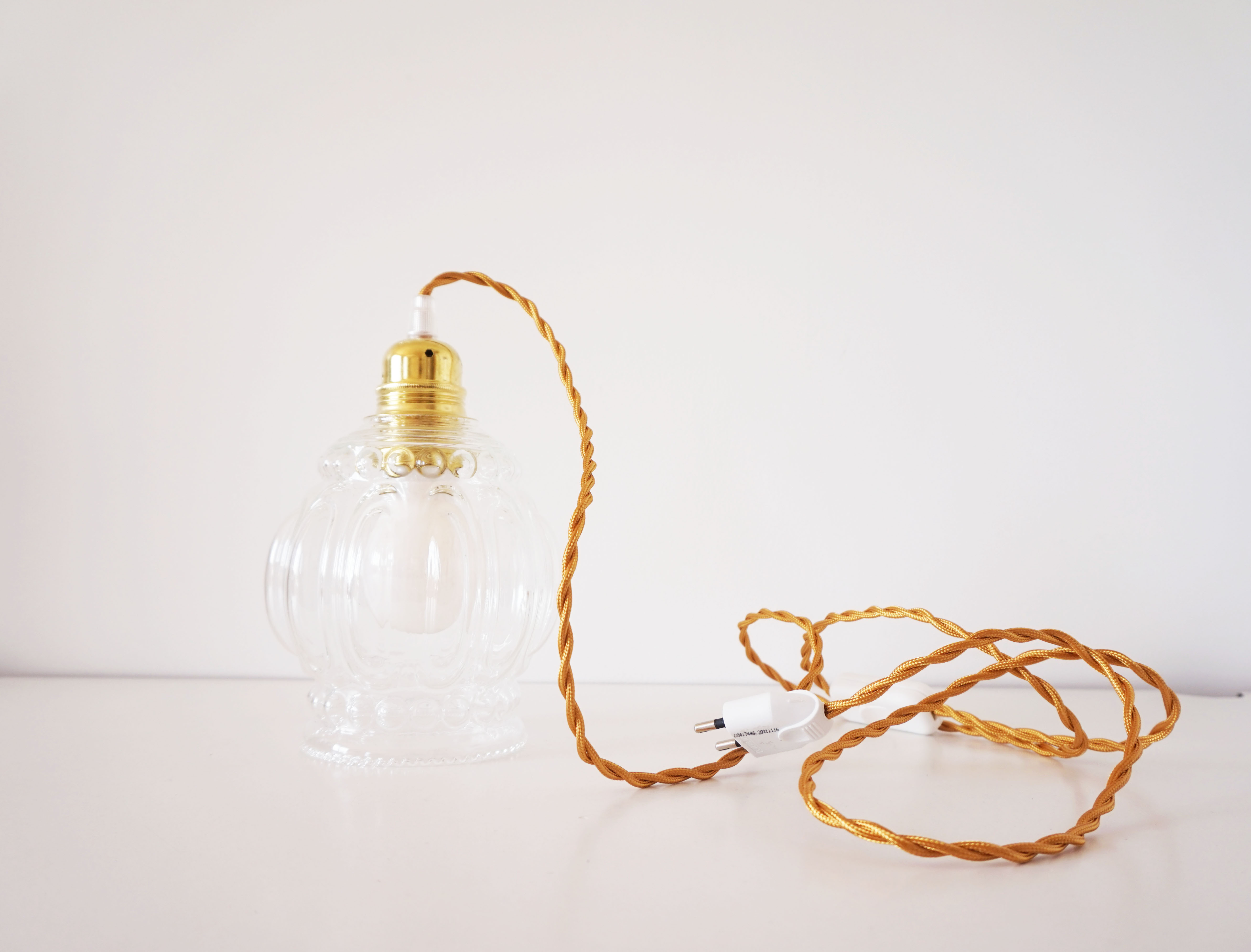 Suspension molded glass globe player