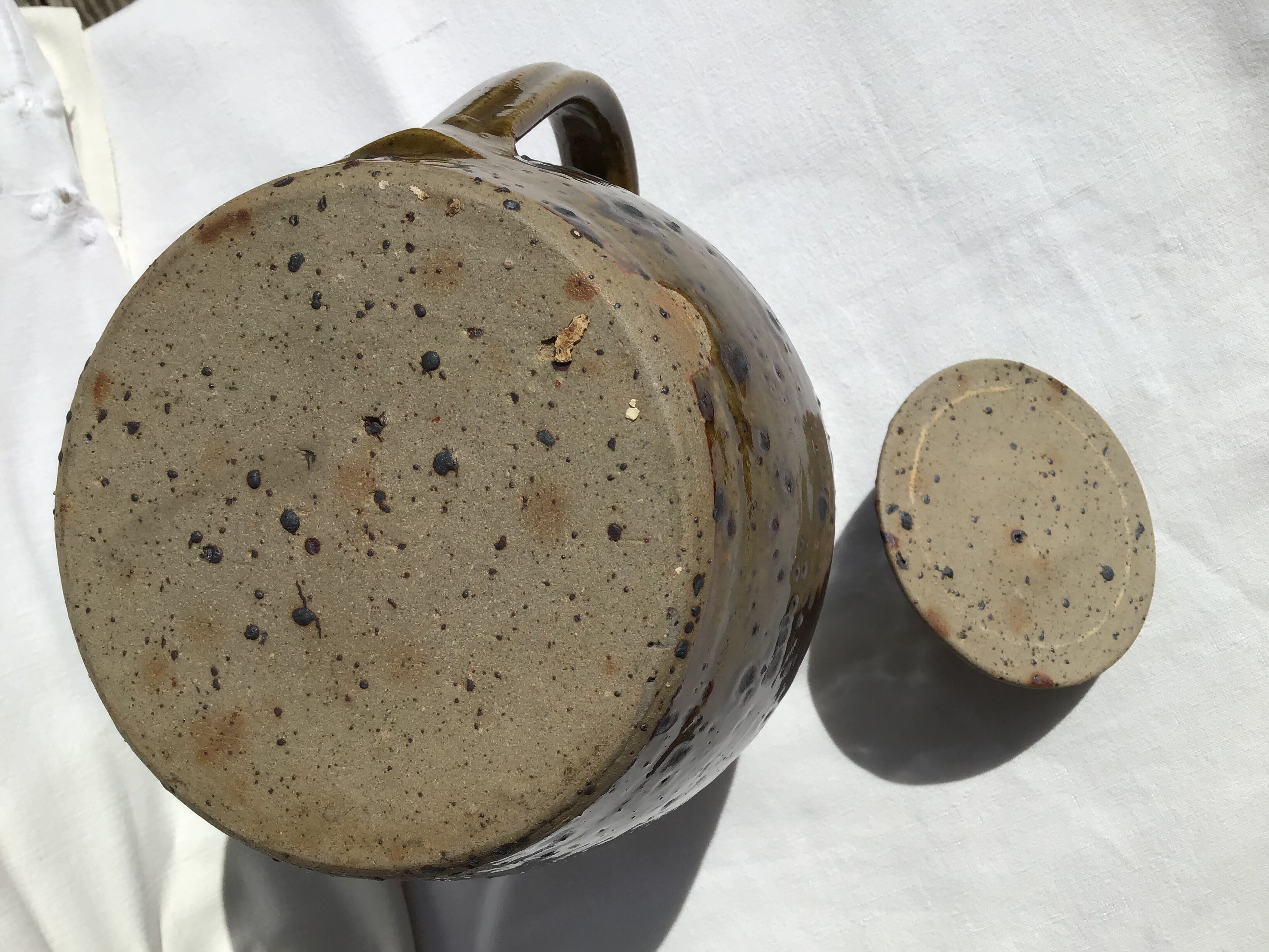 Signed olive green pyrity sandstone tea