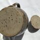 Signed olive green pyrity sandstone tea