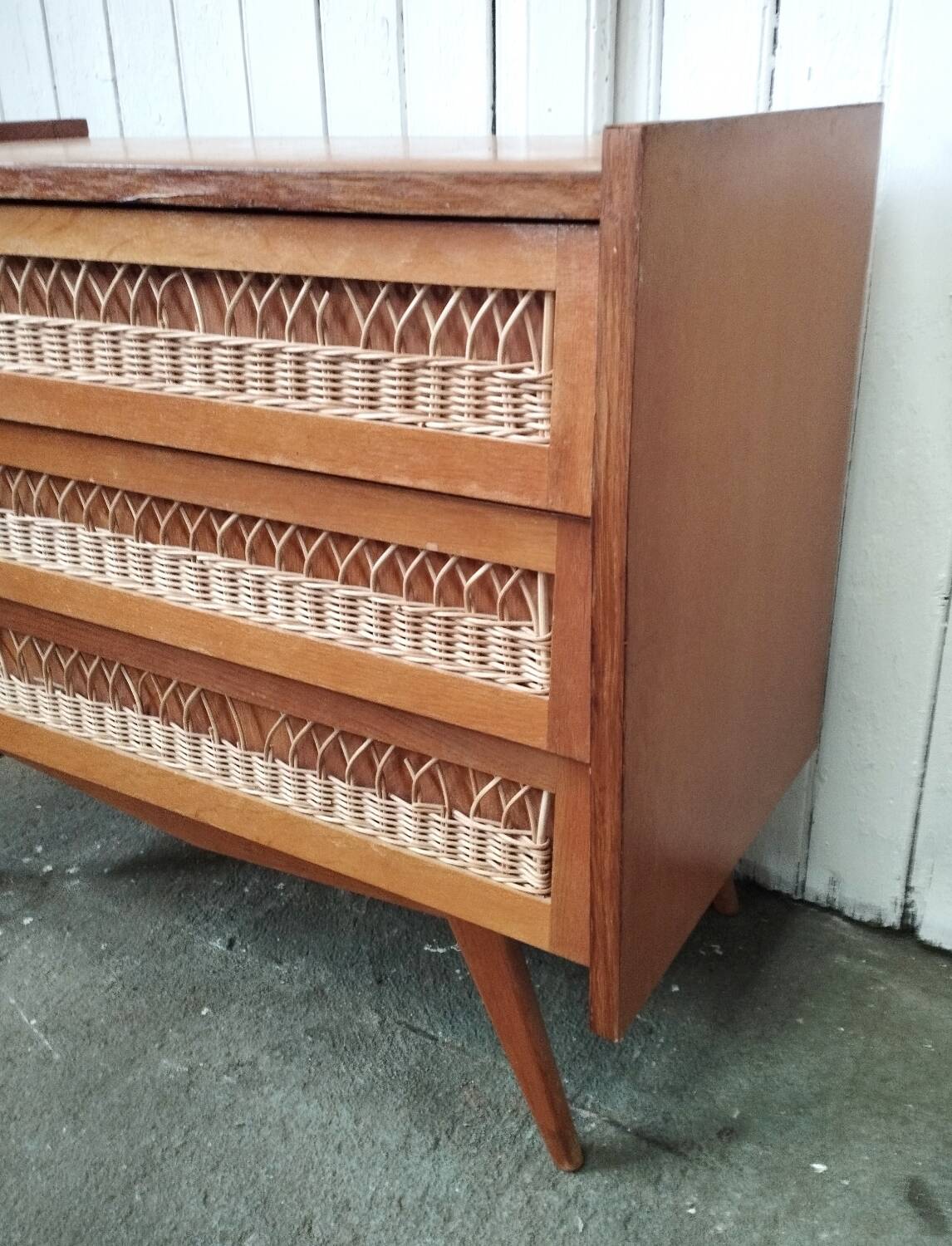 Vintage rattan chest of drawers with compass feet