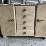 Raw wood chest of drawers with marble top