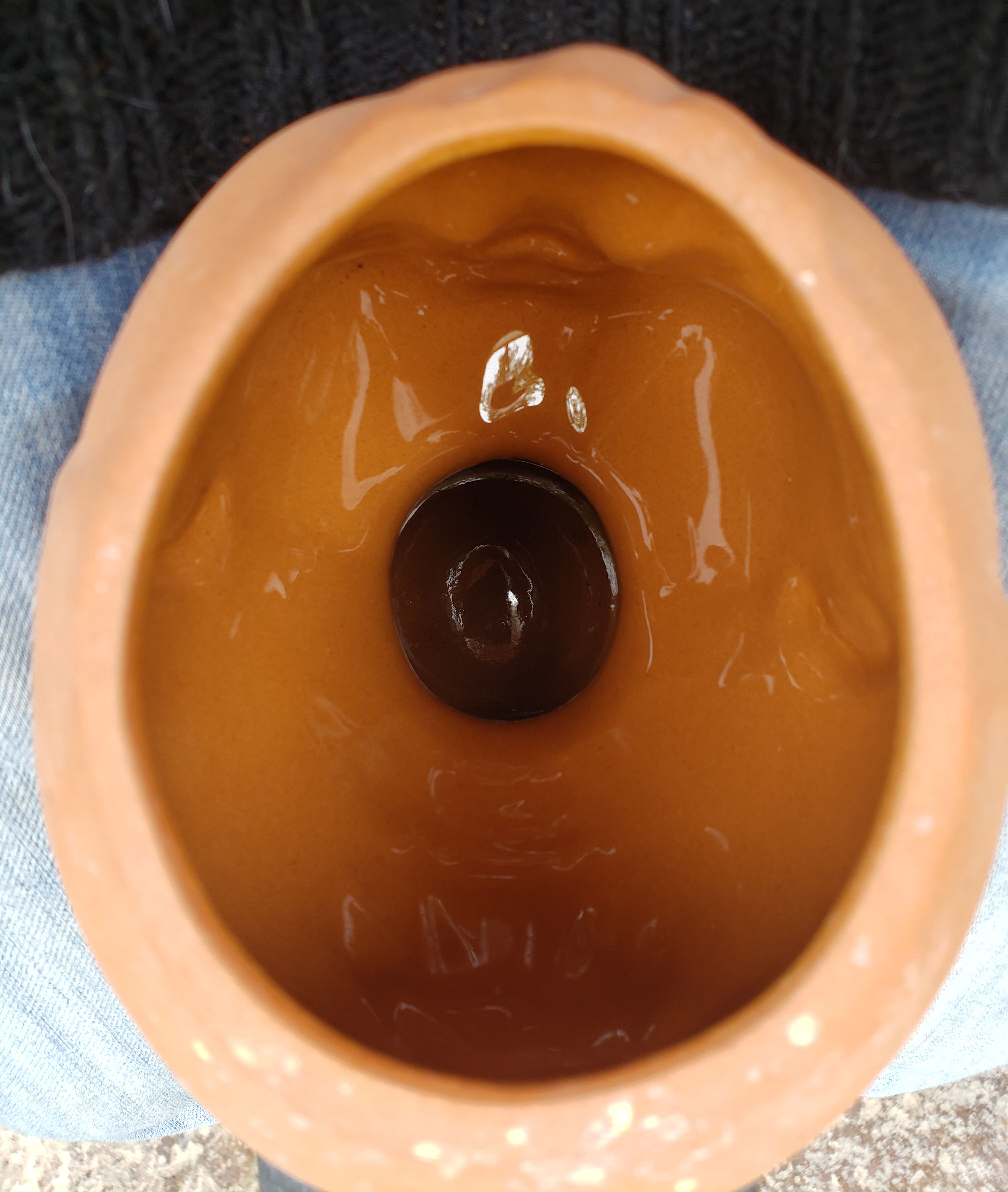 Terracotta pot cover baby head