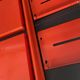 Modular red metal wall shelf in Congresso Lips Vago style.