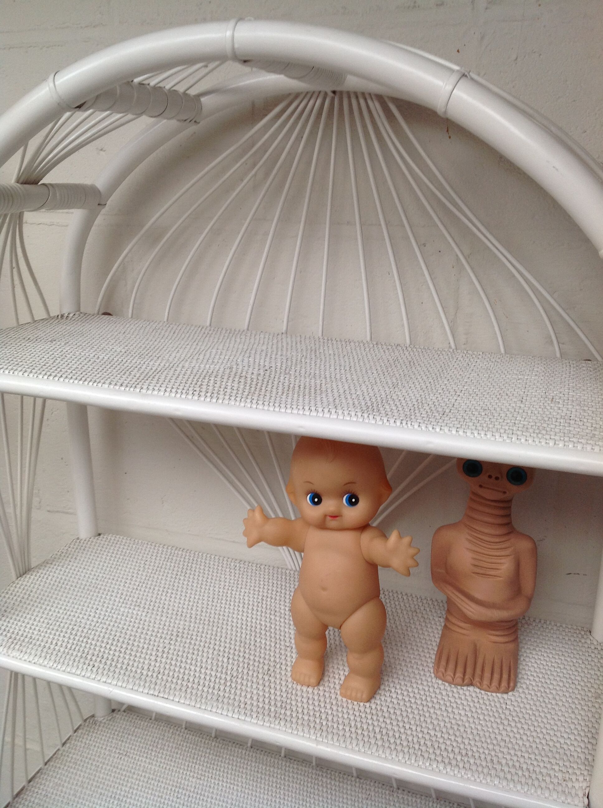 White lacquered rattan bookcase