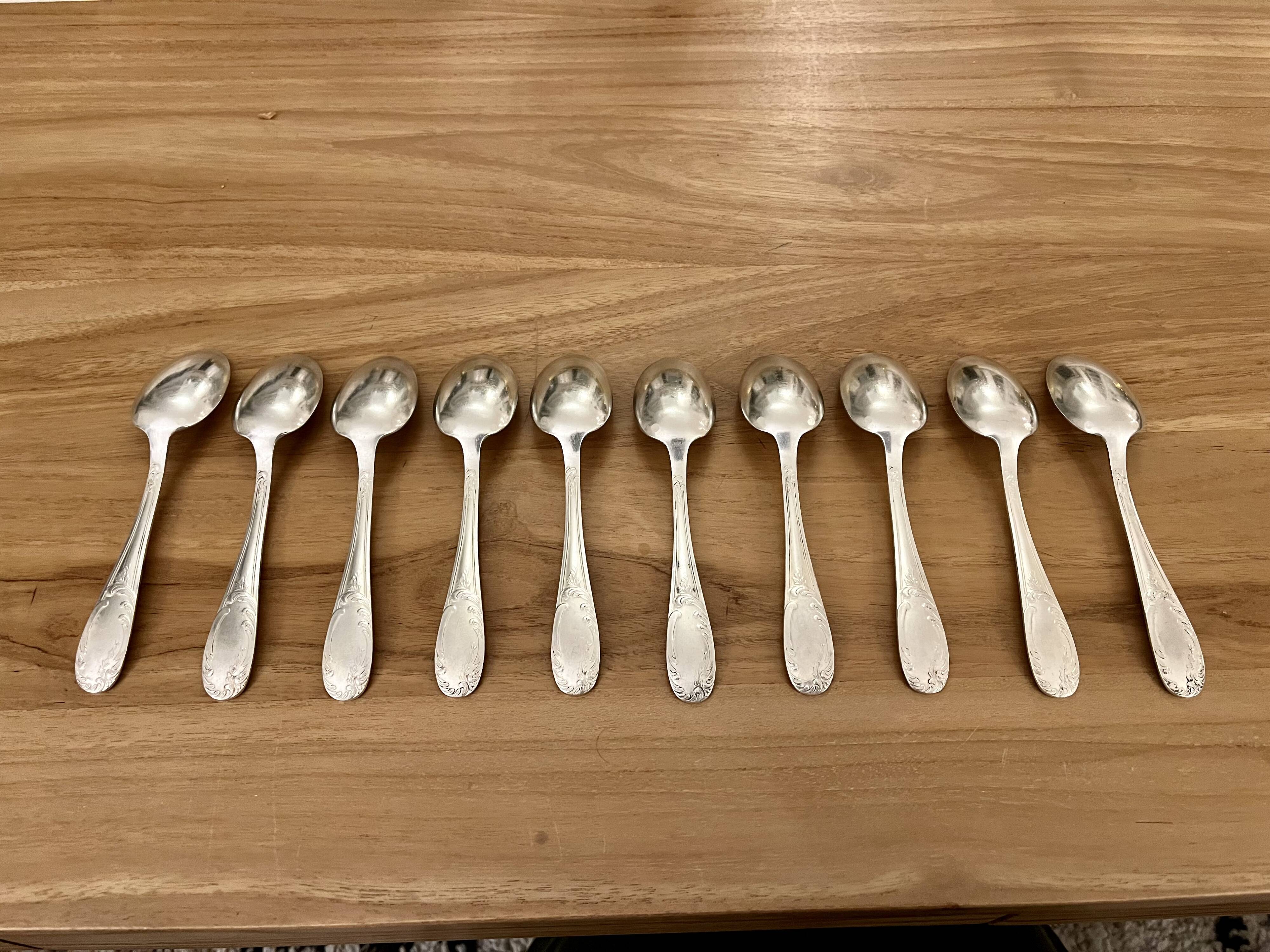 Set of 10 small silver metal spoons