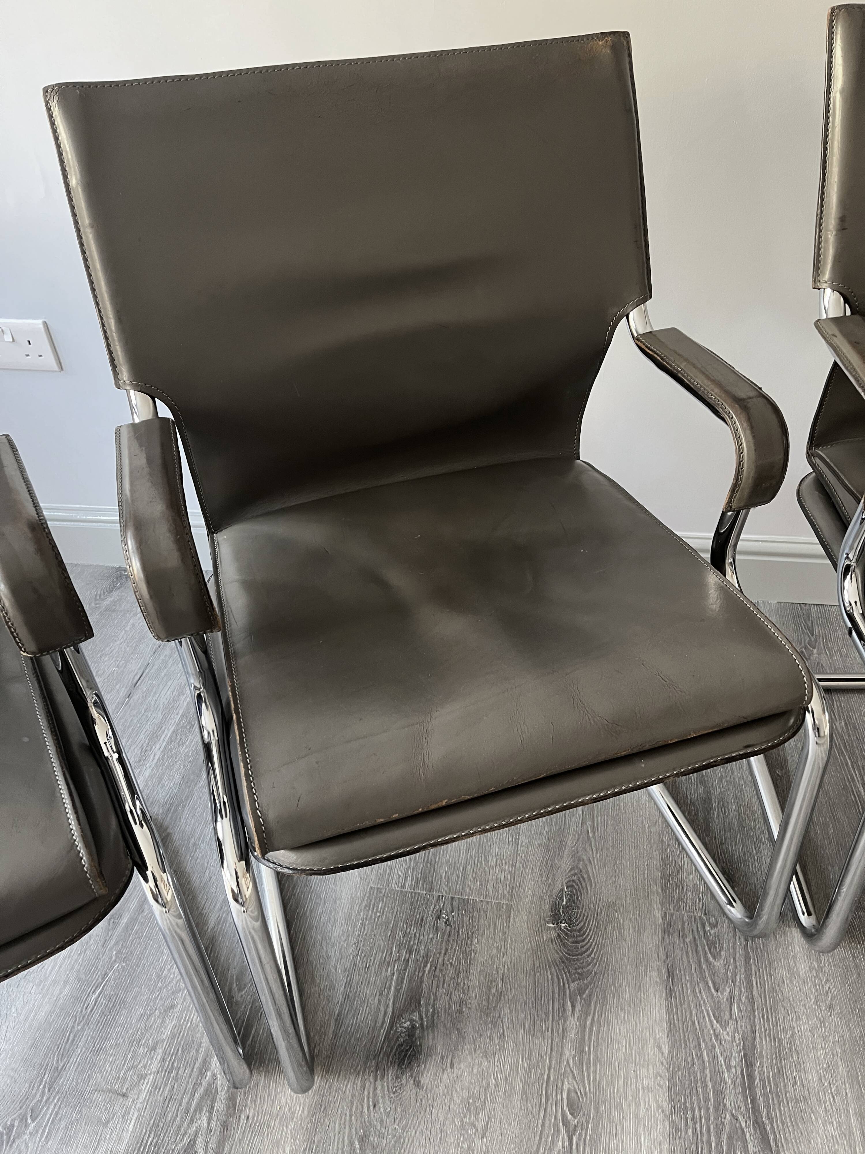 Set of 6 Uno chairs in grey leather on tubular chrome cantilevered frames