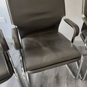 Set of 6 Uno chairs in grey leather on tubular chrome cantilevered frames