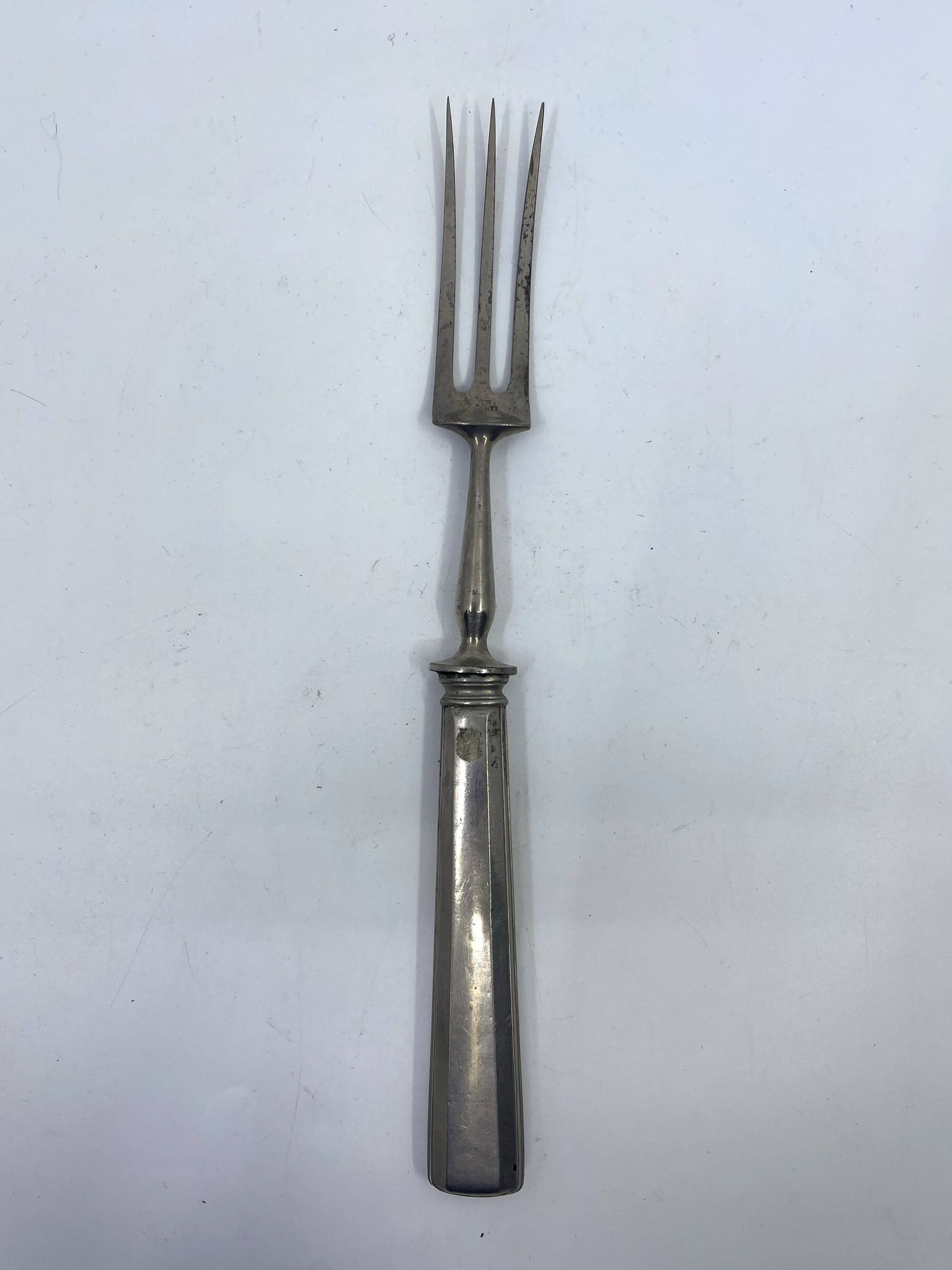 Fourchette de service en métal argenté