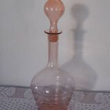 Pink transparent glass carafe with bubble cap