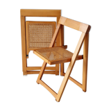 Pair of canned folding chairs.