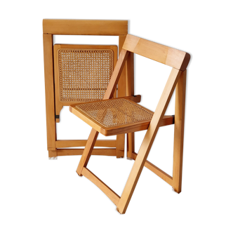 Pair of canned folding chairs.