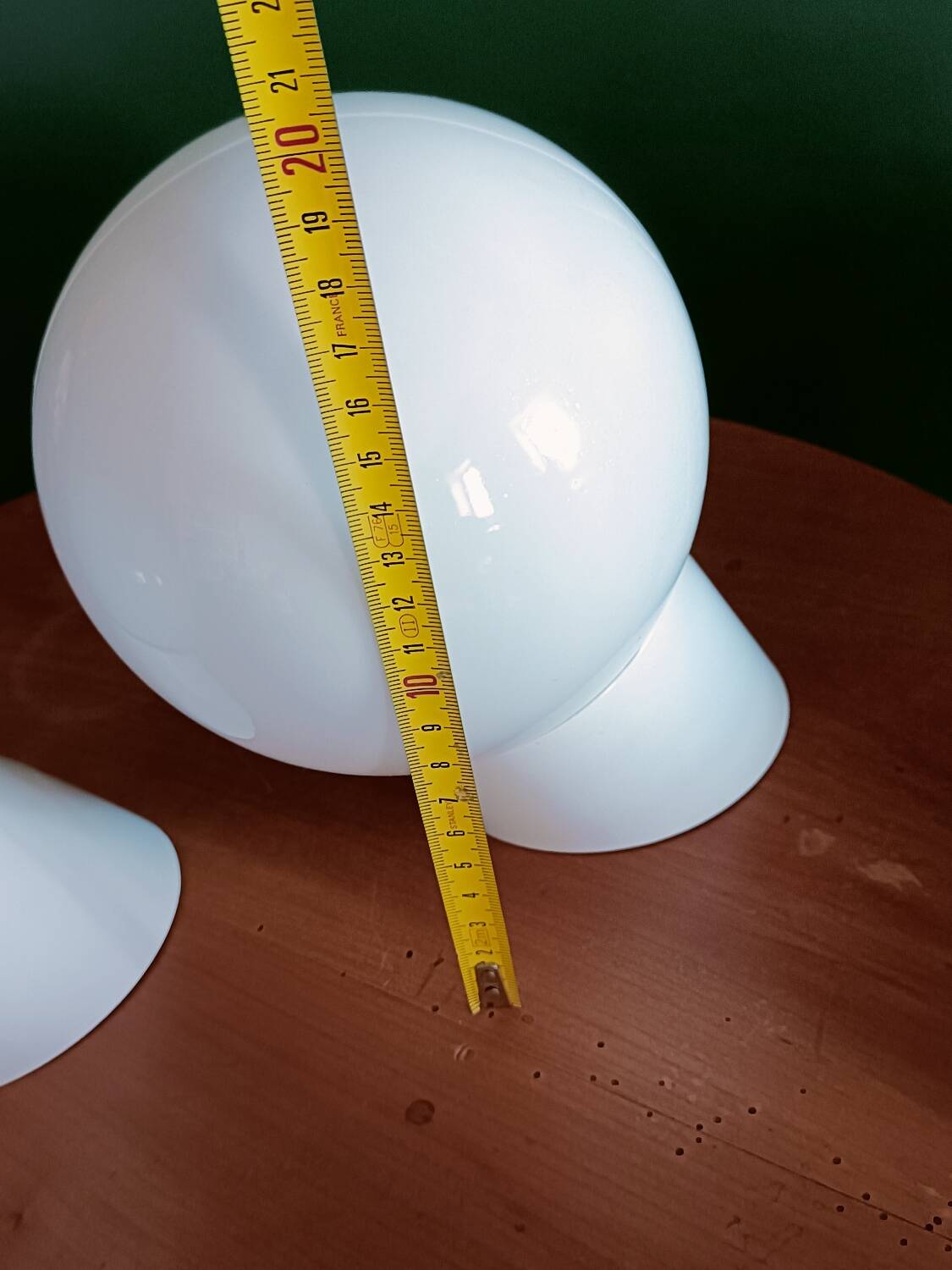 Two opaline glass globe wall lights