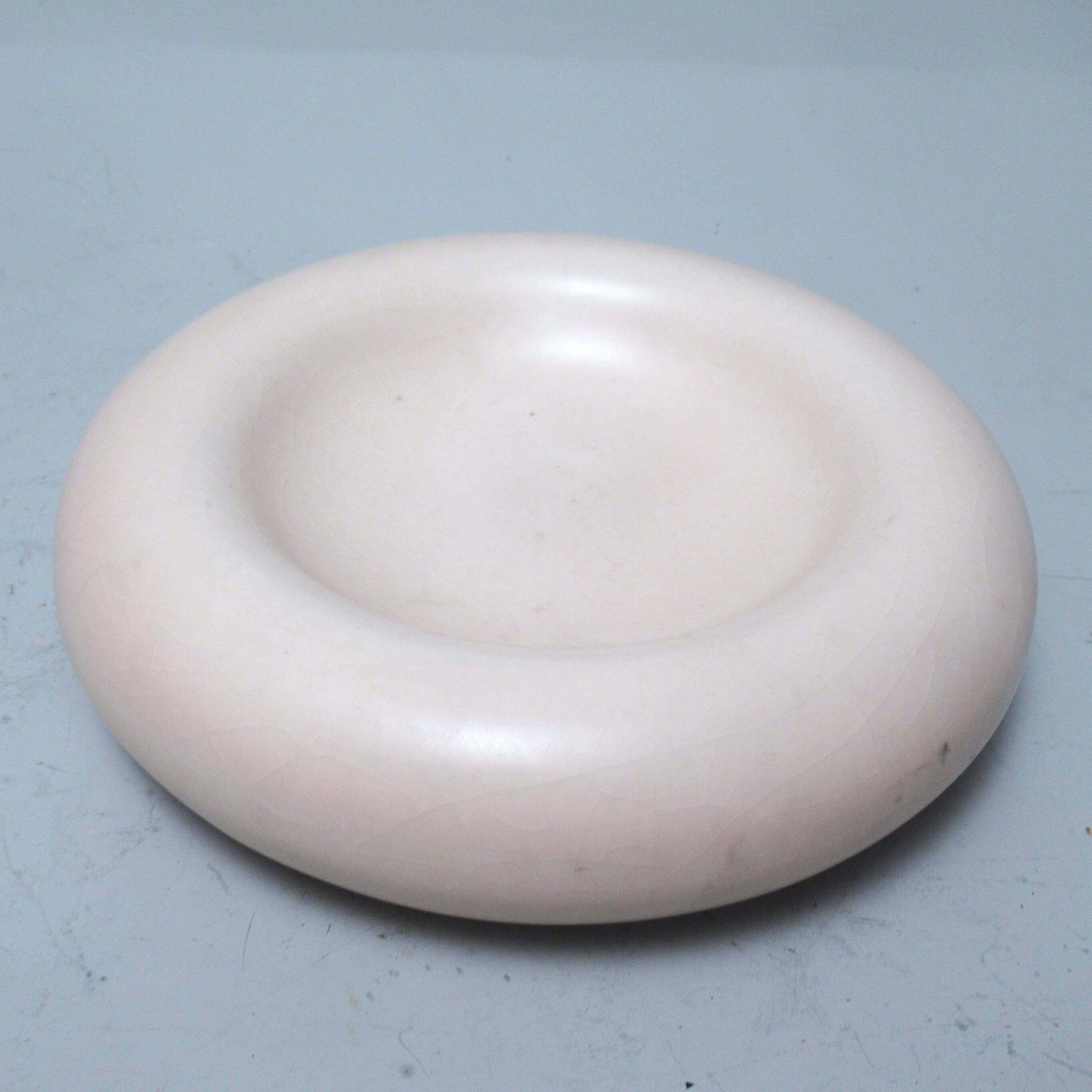Pale pink ceramic ashtray from the 1980s.