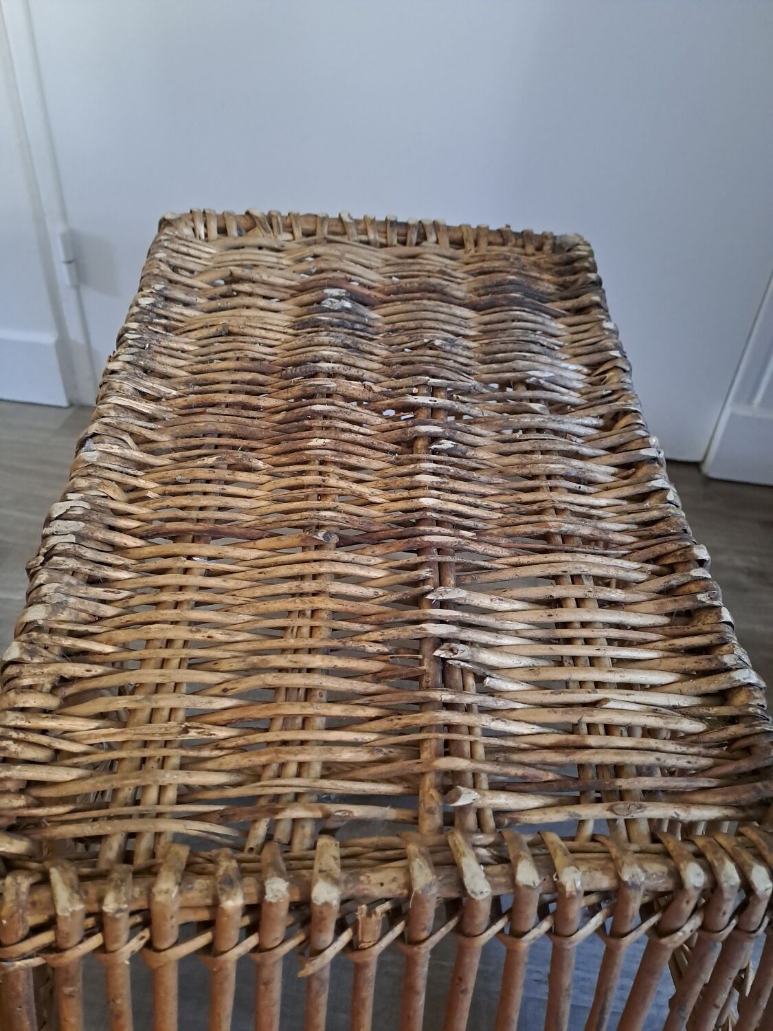 Old rattan laundry basket