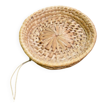 Round basket woven from banana fibre.
