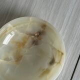 Marbled onyx pocket emptier