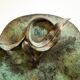 Fruit holder in oxidised brass with floral decoration, Italy 1940s