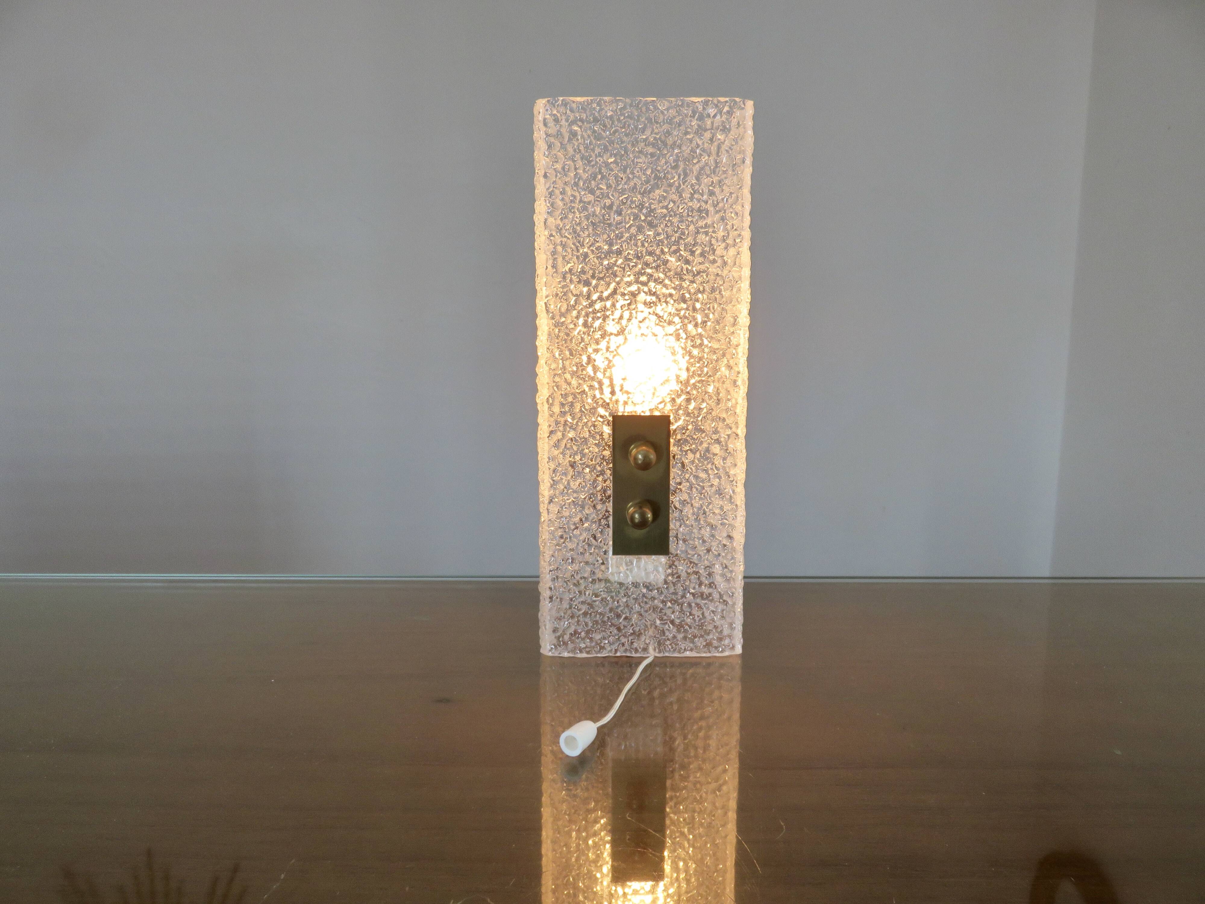 Pair of pull switch wall lights in perspex and gilded brass, France, circa 1960.
