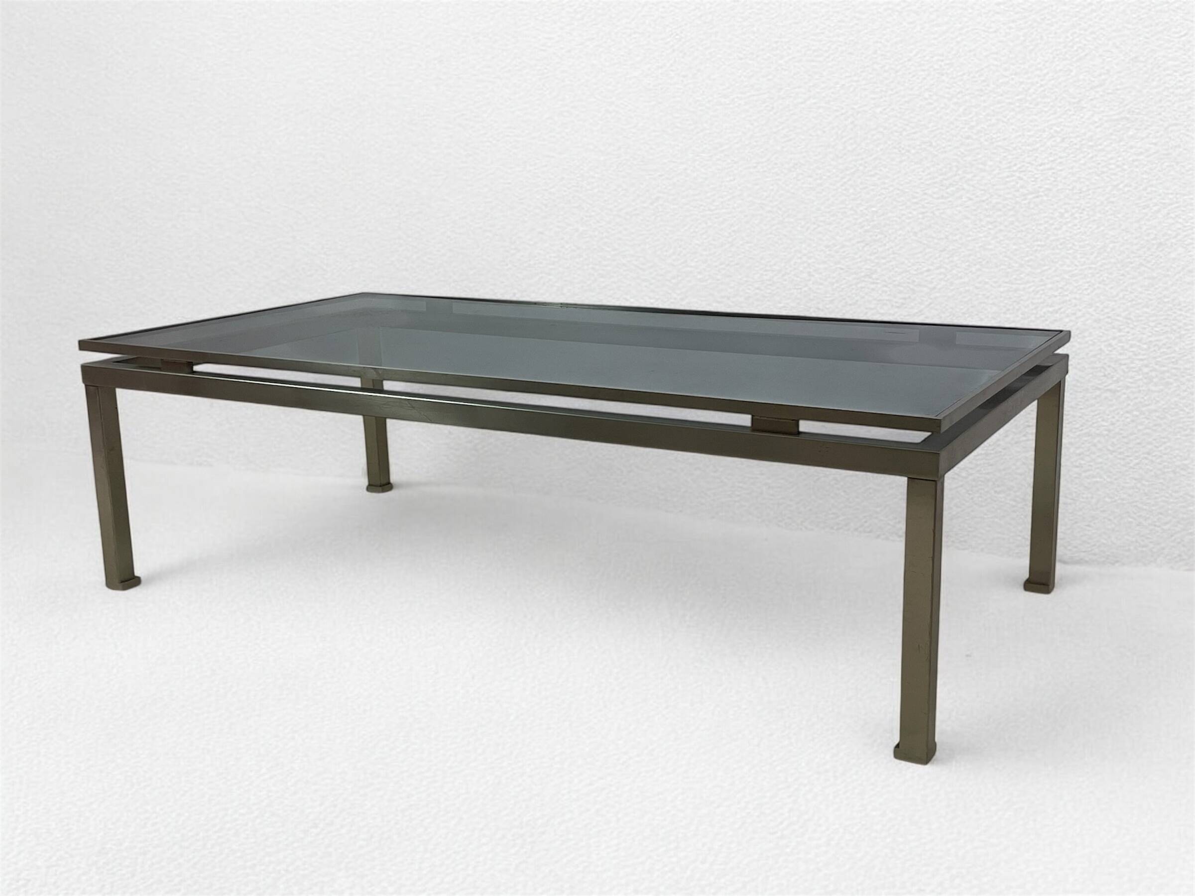 Brass coffee table with smoked glass top by Guy Lefevre, 1970s