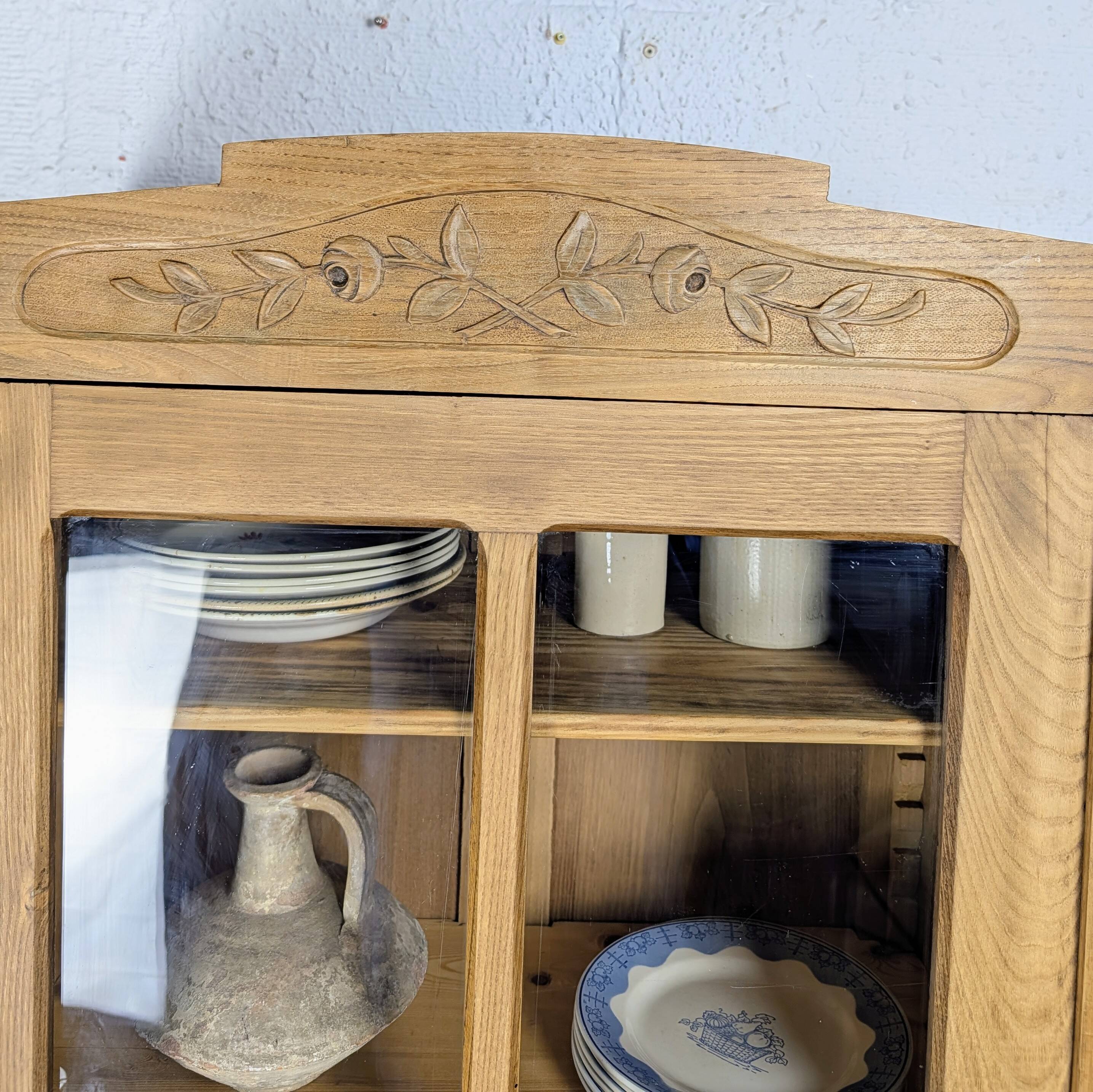 Glass-fronted cabinet from the 1930s-1940s.