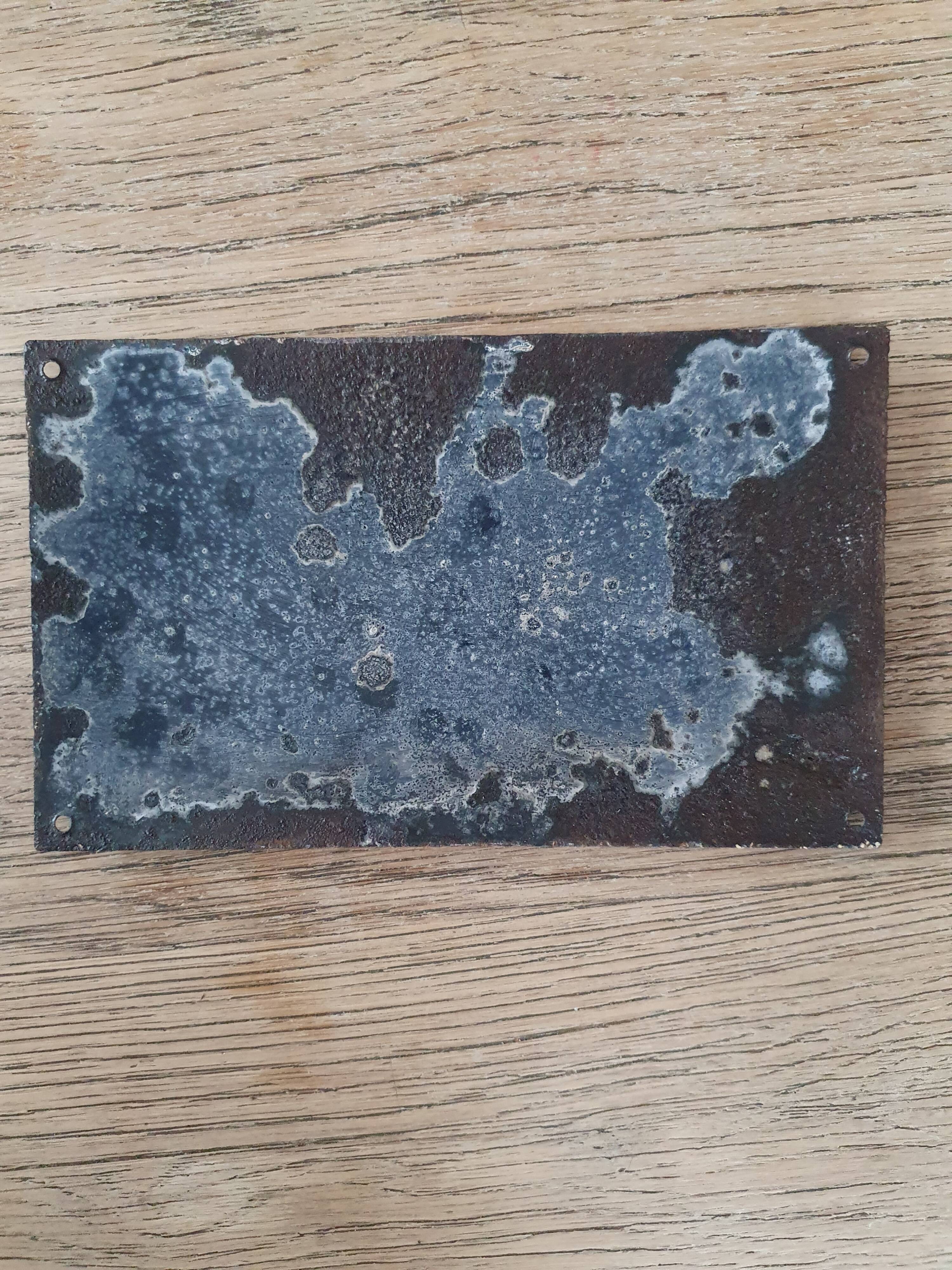 Old enameled house plate