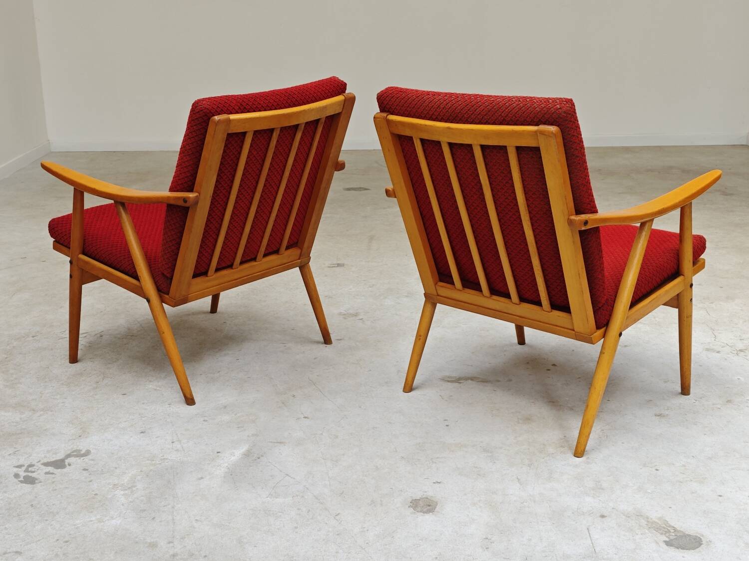 Pair of red Boomerang armchairs by Antonin Suman for Ton Bystrice Thonet