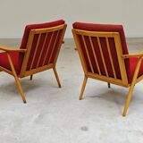 Pair of red Boomerang armchairs by Antonin Suman for Ton Bystrice Thonet