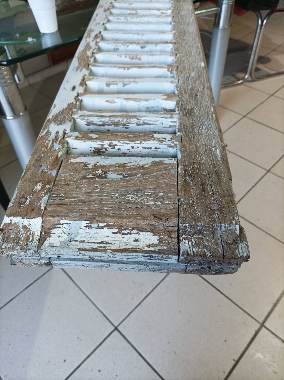 Louvered wooden shutter