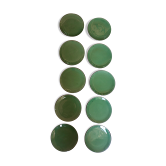 10 green ceramic plates signed "Georges" VALLAURIS